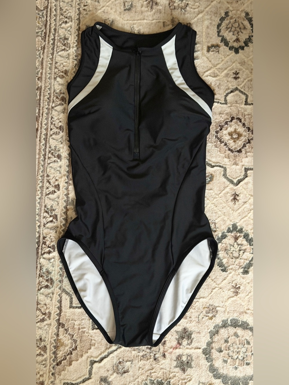 High-Neck Black One-Piece Swimsuit with White Accents